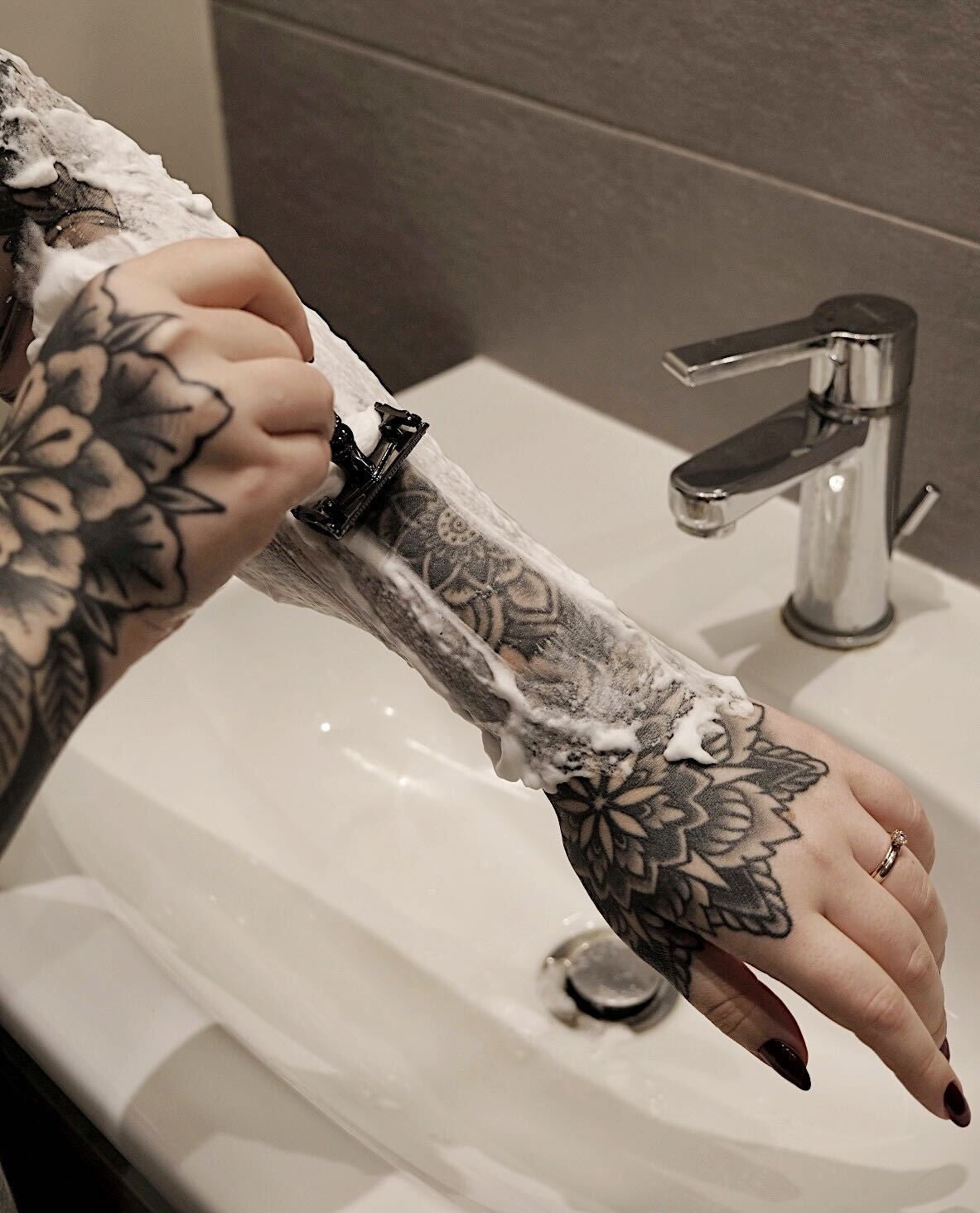 Should you shave your arms if you have tattoos